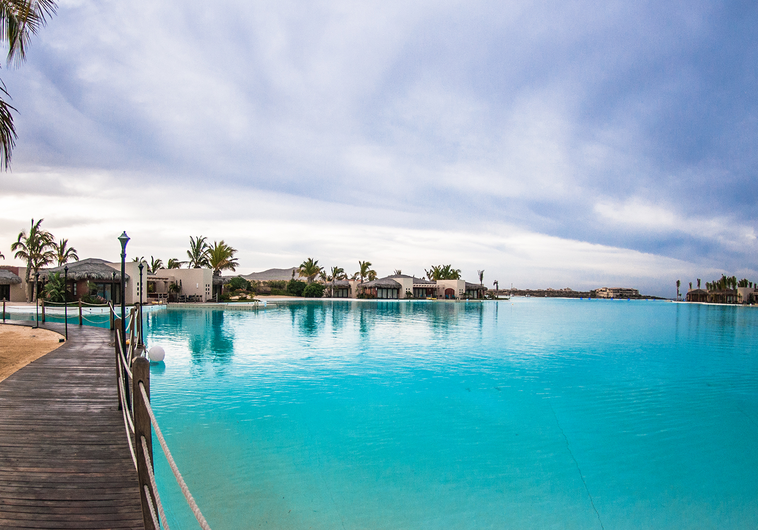 Crystal Lagoon aerial with kayakers and turquoise water