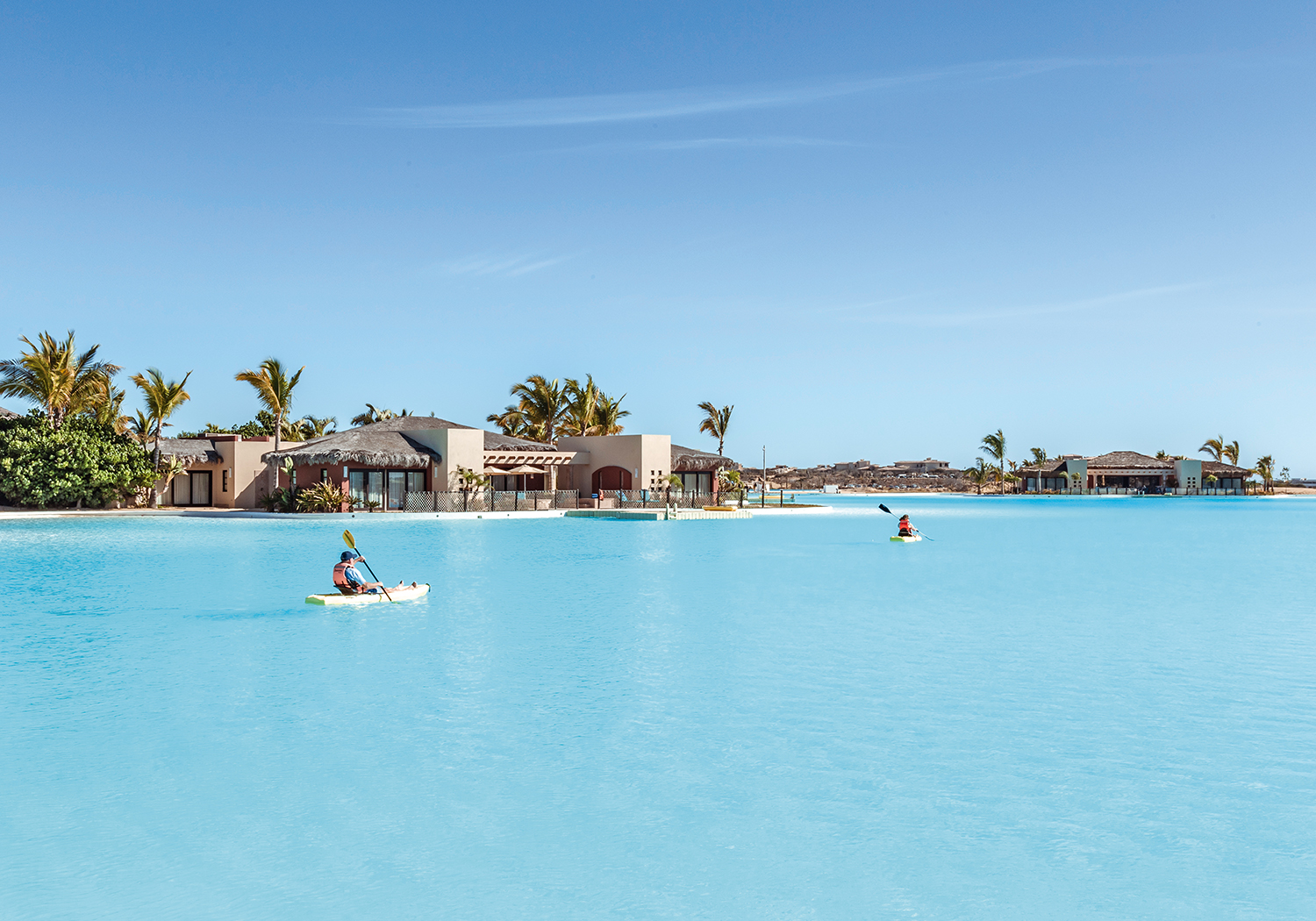 Crystal Lagoon boardwalk and cabana seating