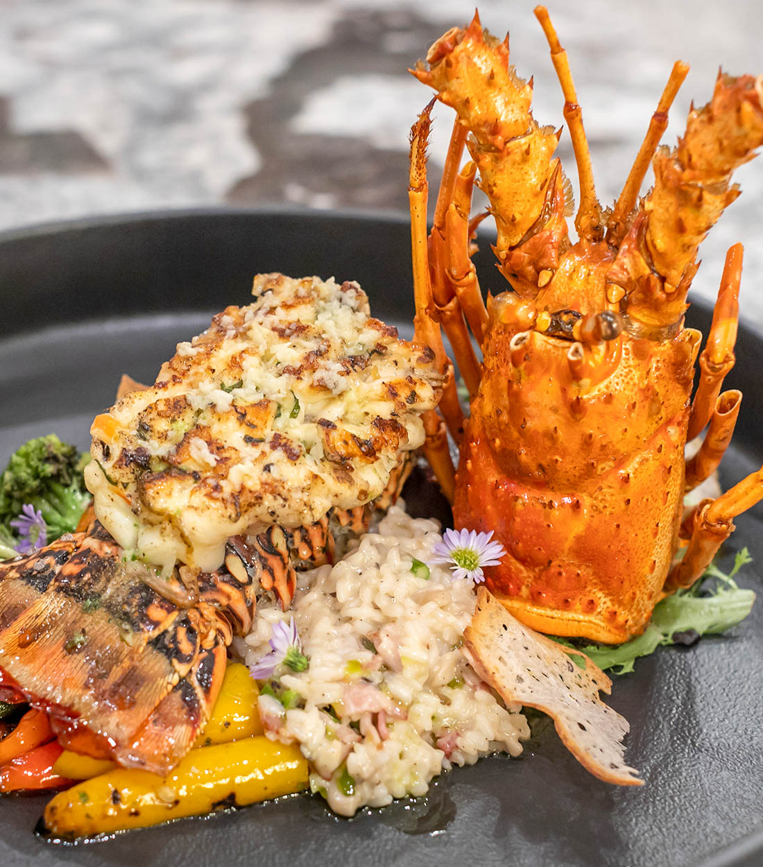 Lagoon-side outdoor dining at Diamante resort